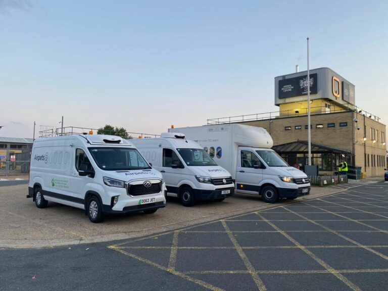 Fleet of three Airpets pet transport vans parked outside Heathrow Animal Reception Centre